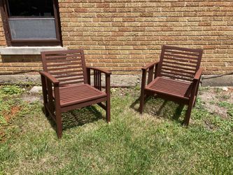 Two outdoor patio chairs