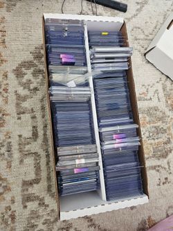 Box full of Baseball Basketball Football cards Auto Signed Low Number Rookies Jersey Sold As A Lot Sports Card