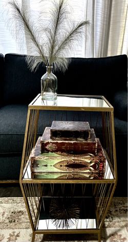 Gold finish mirrored glass side table