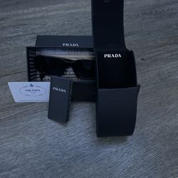 Black and Silver Prada Sunglasses.