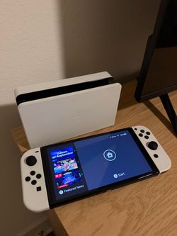 Nintendo Switch OLED with Dock + Mario Kart 8