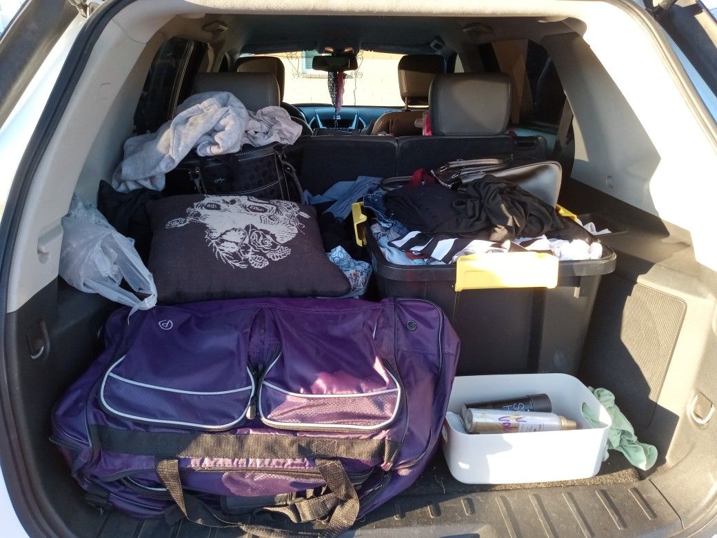A Whole Suv Full Of Clothes Etc
