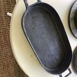 VINTAGE CAST IRON GRIDDLE. 