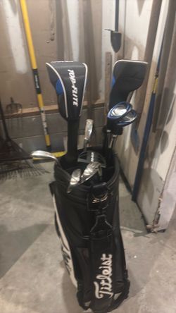 Full set of  left handed clubs in a titleist bag