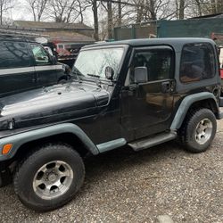 1999 Jeep Wrangler With Plow