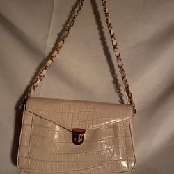 Bloomingdales off white purse with gold chain strap