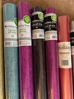 11 Roll Of Gift Wrap from Holiday Time & Holiday Elegance.