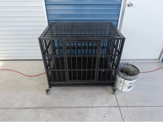 Cage with clean out pan
