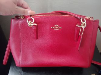 Red Coach purse. Can wear as a shoulder bag or cross body!