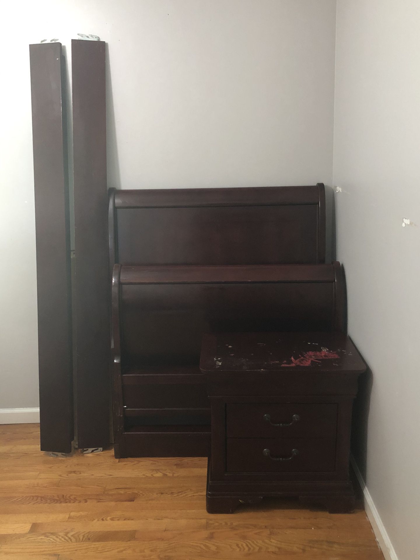 Haverty’s solid cherry oak twin sleigh bed with night stand, and full size dresser with mirror.