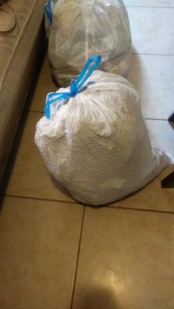 Three bags of baby boy clothes