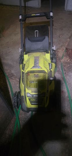 Ryobi lawn mower and blower  with battery charger and battery