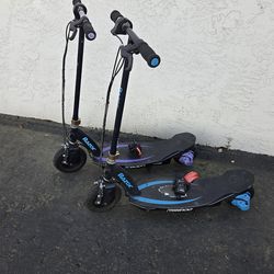 Two Razor Power Core E100 Electric Scooters