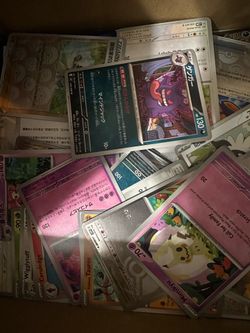 Box of mint Pokemon cards assorted for the taking