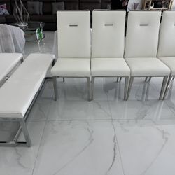 4 White Chairs And Two Benches 