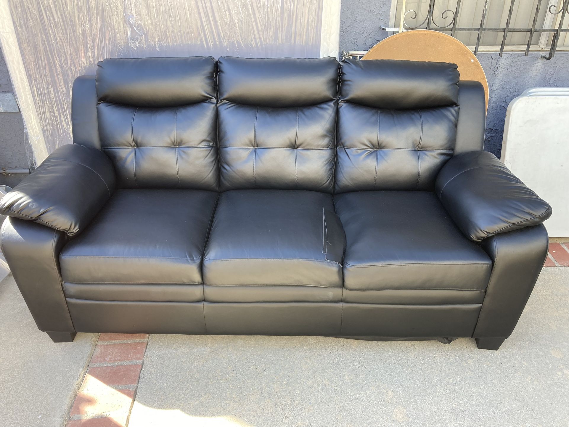 Black Faux Leather Couch