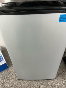 Compact fridge unused