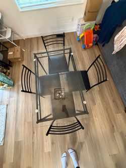 Glass table with 4 matching chairs