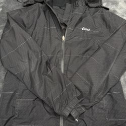 ASICS black and white Men’s Medium windbreaker jacket with removable hood in good shape but one rip on wrist. #outdoor