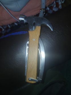Kikkerland 10-in-1 Hammer Multi-Tool featuring a stainless steel hammer head and a beech wood handle.