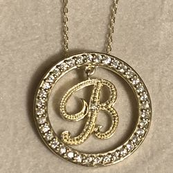Initial Letter B, Necklace. Gold Over Silver.  CZs Encircle The Floating“B”.  Chain Is About 22-24 Inches. 