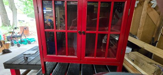 Red Cabinet w/ frame glass doors