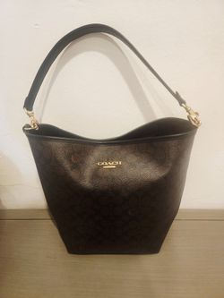 BOLSA COACH..COMO NUEVA..UN DETALLE