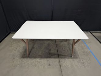 Modern RectangularTable with White Top and Tapered Wood Legs