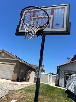Basketball hoop with adjustable stand