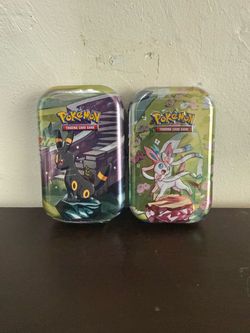 Pokemon prismatic evolutions tins