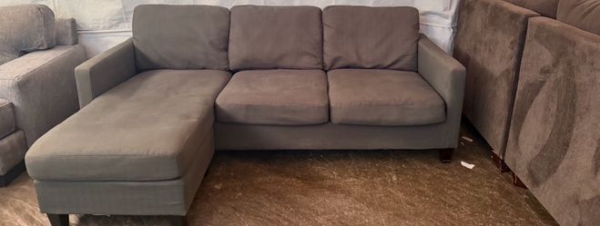 Gray couch with reversible chassis 250 pick it up today 290 with delivery