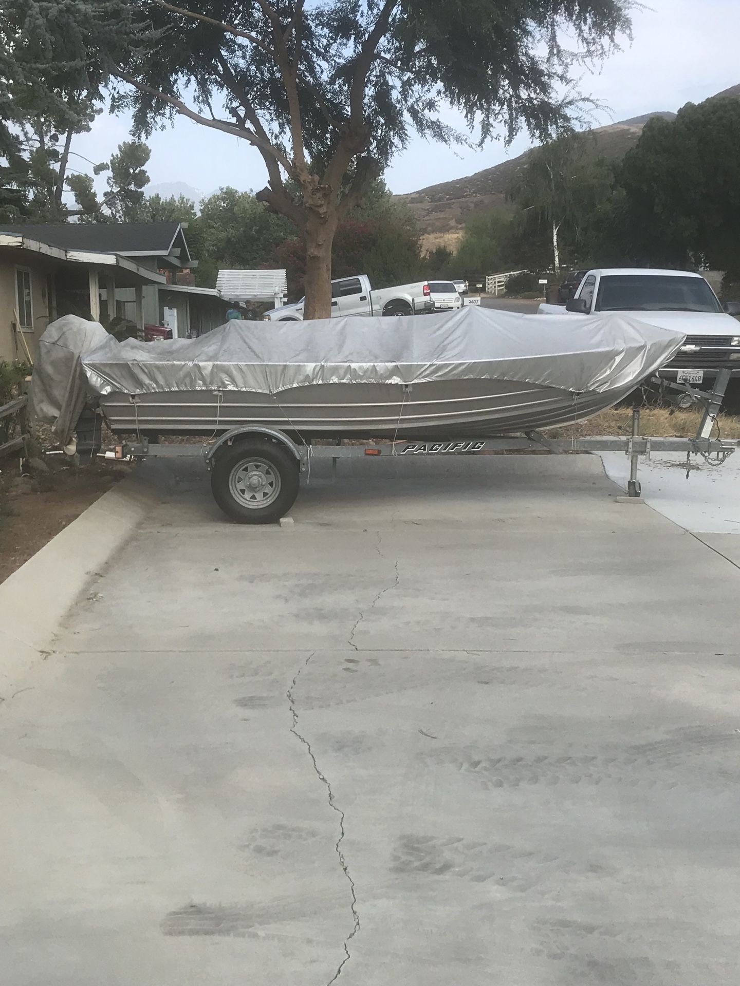 14 foot Westcoaster 2 seat aluminum fishing boat with salt water trailer.