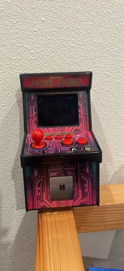 Retro arcade cabinet styled with over 200 games