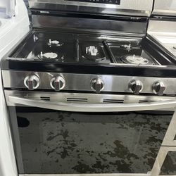 Samsung 30-in 5 burners 6.0-cu ft Air Fry Convection Oven Freestanding Natural Gas Range ( Fingerprint Resistant Stainless Steel )