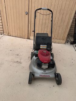 Honda gas lawn mower with Twin blade and bag and  works! 3 in 1 system dual blade