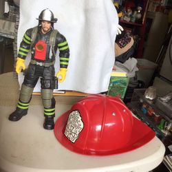 Collectible Fireman Figure And Helmet 