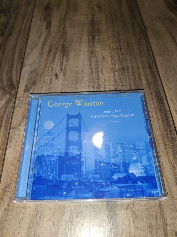 Linus & Lucy: The Music of Vince Guaraldi by George Winston (CD, Sep-1996). Has some wear from age and storage. Sold as is.