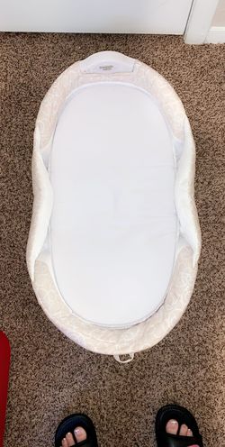 Portable snuggle nest sleeper