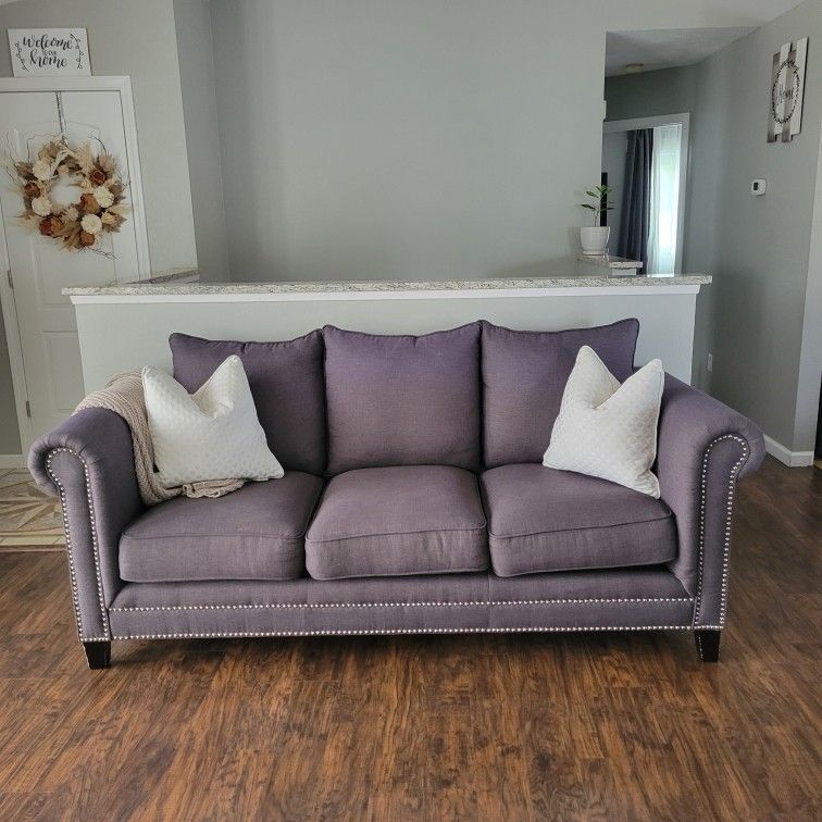 Beautiful studded couch and love seat set! Great condition