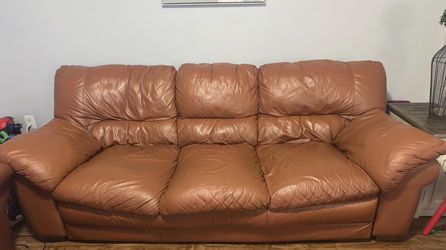 Brown leather living room set..