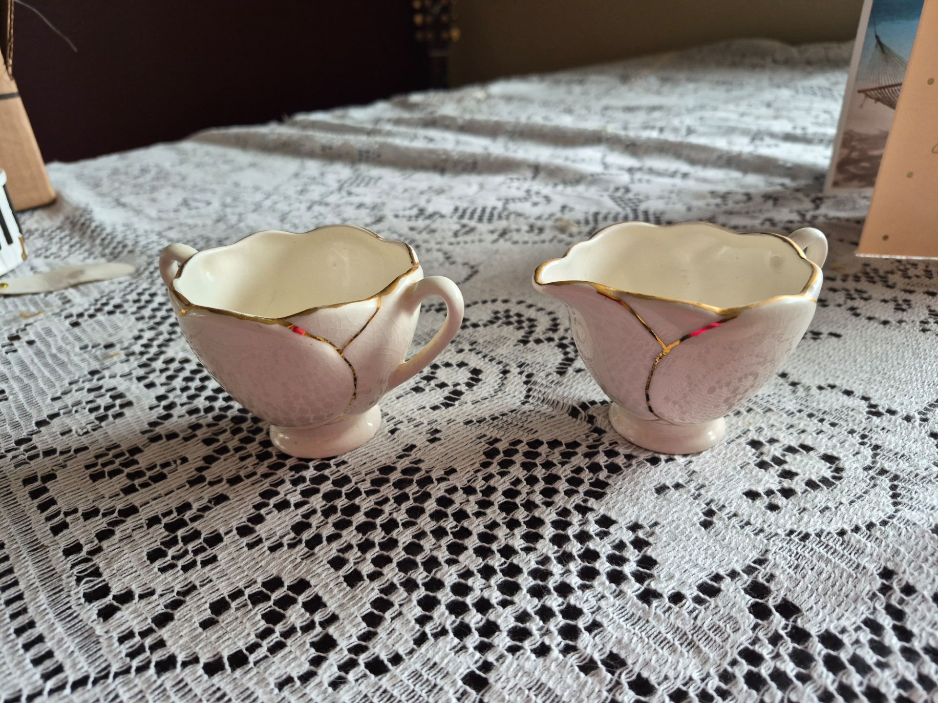 Antique cream and sugar set