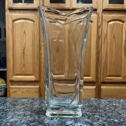 Vintage Clear Heavy Glass Flower Vase.   Size approximately 9 inches tall.  Preowned Excellent condition.  Has been on display in a cabinet.  Smoke fr