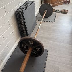 Olympic Weights And Bar With Floor Mats
