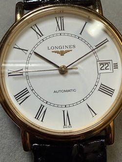Brand new golden longine