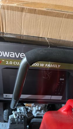 LG brand new microwave in the box