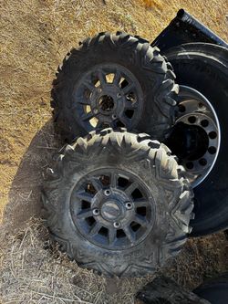 2 front rzr wheels