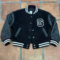 Gap Kids Varsity Logo Bomber Jacket in black with white-striped trim and a "1969 G" Sml Youth