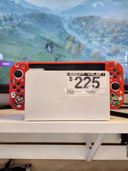 Nintendo Switch OLED with Mario Joy-Con Covers