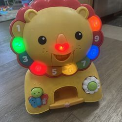 Fischer Price Ride On Lion Light Up 