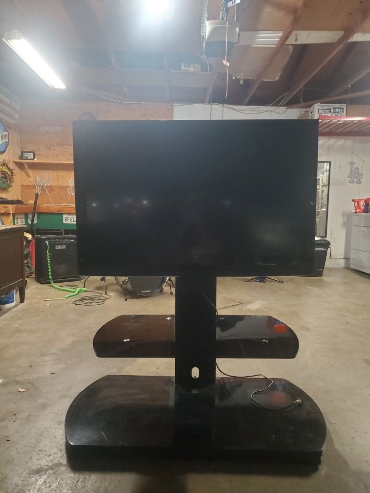 40 in. Panasonic TV and TV Stand